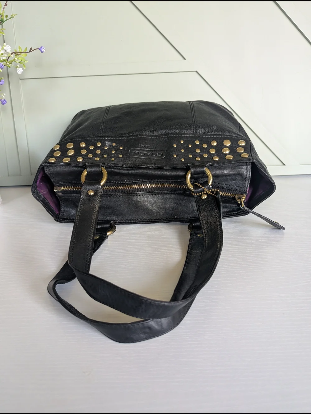 Coach Black Leather Shoulder Bag with Gold Stud Accents